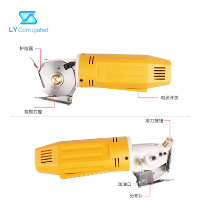 กรรไกรตัดผ้าไฟฟ้า 170W สีเหลือง ใบมีดตัดกลม ชิ้นส่วนเครื่องจักรสิ่งทอแบบพกพา